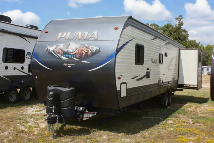 A Puma by Palomino travel trailer RV with extended slide-out, perfect for an rv rental or camping adventure.. Palomino Puma 2018