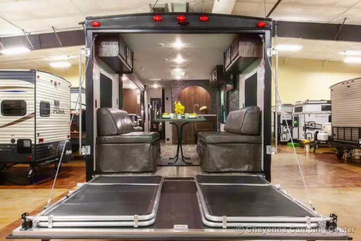 Explore this modern RV rental's spacious interior with a full kitchen, lounge, and rear ramp patio.. Forest River Cherokee Grey Wolf 294rr 2020