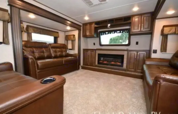 Living room view with two pull out queen beds. Other Avalanche 2019