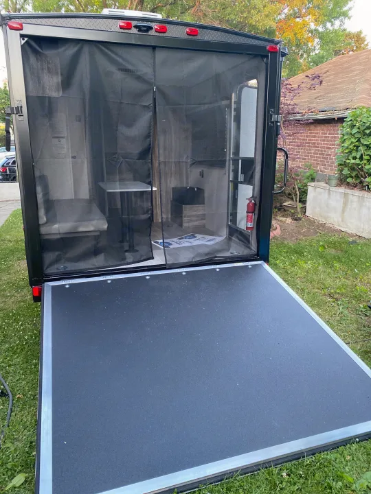 Bug screen with lounge setup. Forest River Wildwood 2021