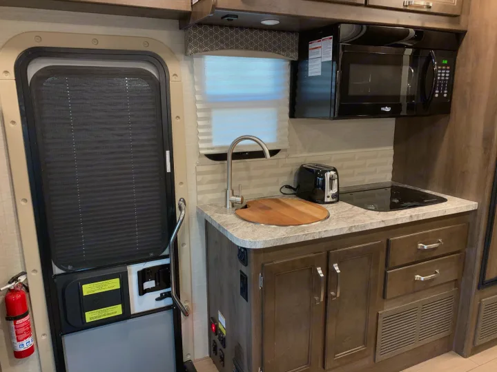 Kitchen (Sink, Stove, convection/microwave oven, lots of storage. Jayco Melbourne 2019