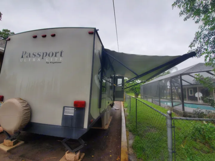 Back view and awning.. Keystone Passport 2016