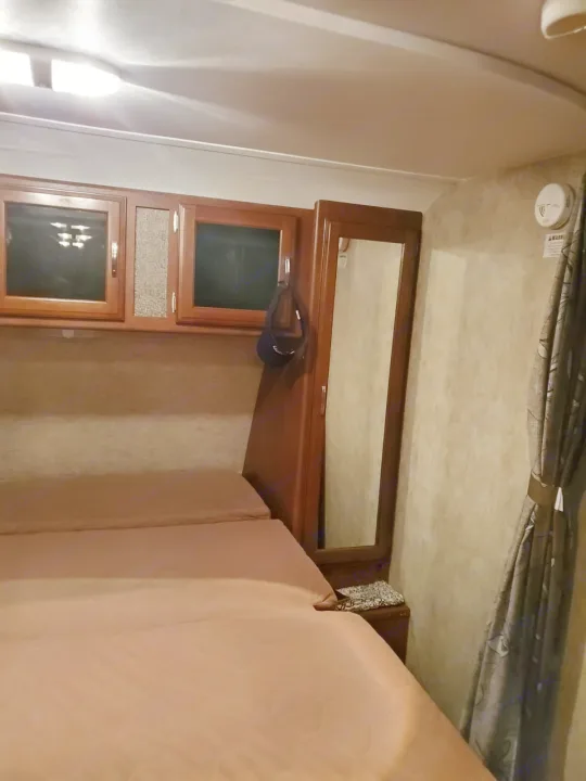 Queen-size Murphy bed (right side).. Keystone Passport 2016