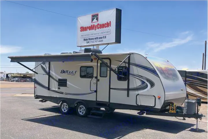 Bullet Ultra Lite travel trailer for rv rental, with 'ShareMyCoach' sign promoting privately owned RV rentals.. Keystone Bullet 2016