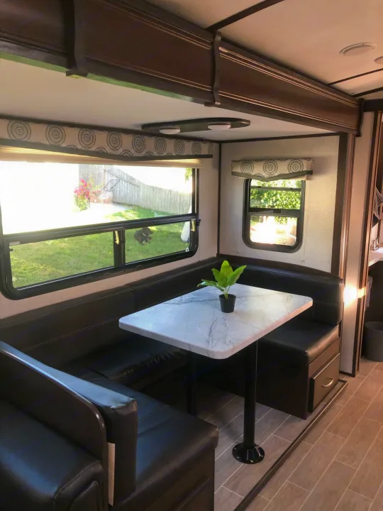Large U-shaped dinette, big enough to fit the whole family. This dinette also converts to a bed.. Dutchmen Other 2020