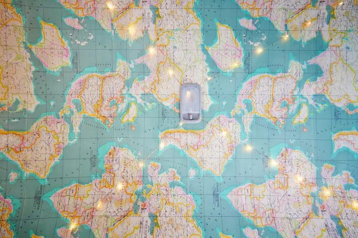 Navigate your RV rental adventure with this unique world map ceiling! An RV light & string lights illuminate the journey.. Toyota Voxy 2004
