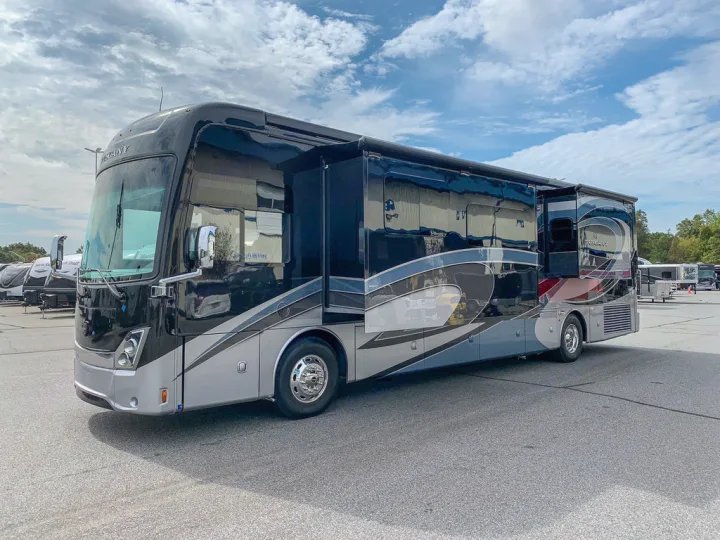 This sleek black and silver Tuscany motorhome is a prime RV rental for luxurious travel.. Thor Motor Coach Tuscany 2019