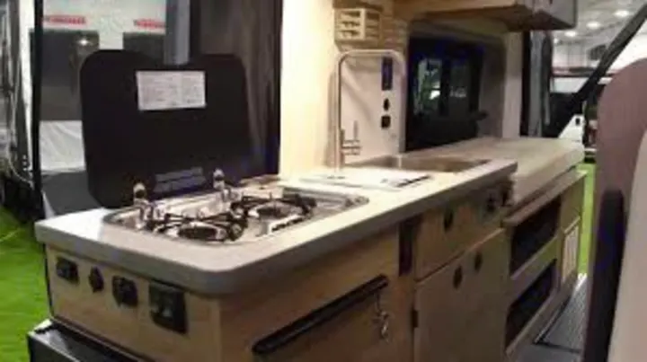 Nice kitchen layout with murphy bed in the back. Winnebago Other 2021