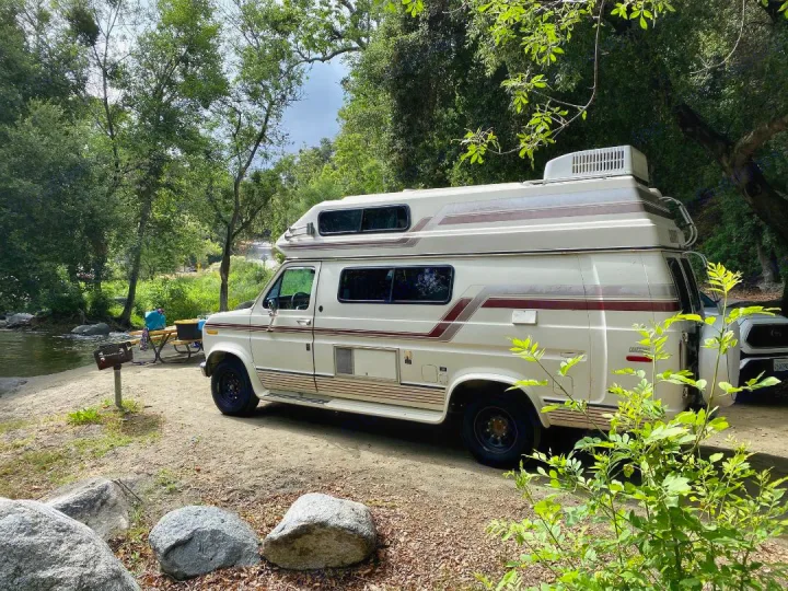 Compact size makes this vintage beauty a stellar option for both traditional campgrounds AND RV parks.. Ford Econoline 1991