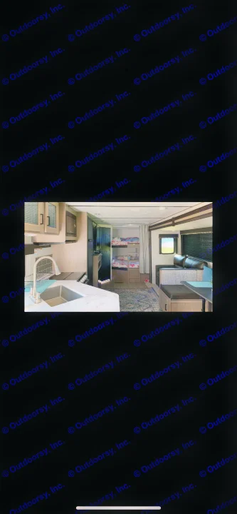 Modern rv rental interior with kitchen, bunk beds, and living area. Perfect for travel adventures!. Keystone Bunkhouse 2020