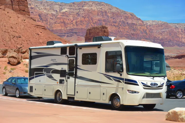 "Ed" on an Edventure out West, towing a car. Jayco Precept 2016