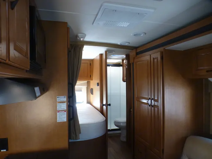 custom mattress on master bed, full shower in bath room. Coachmen Prism 2150LE 2013