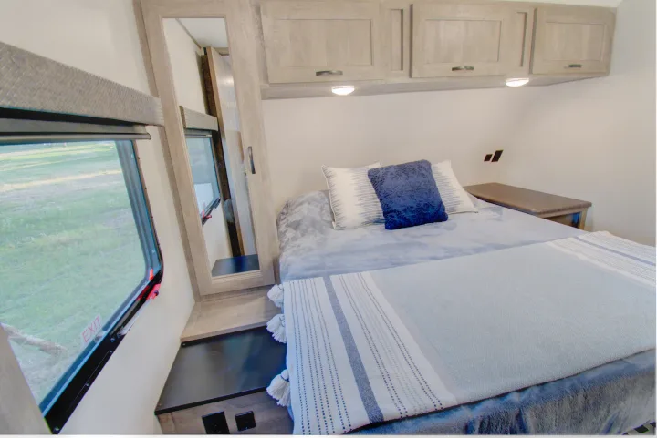 2 closets in bedroom with overhead storage. Forest River Vibe 2020