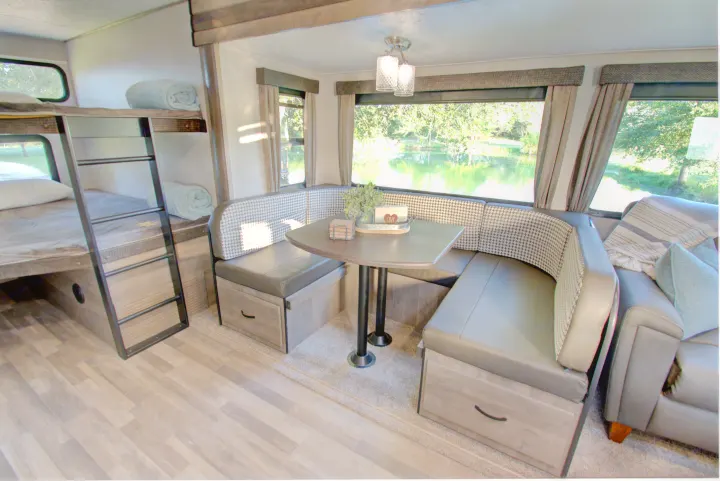 Dinette converts to full size bed. Forest River Vibe 2020