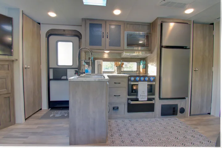 Upgraded kitchen appliances. Forest River Vibe 2020