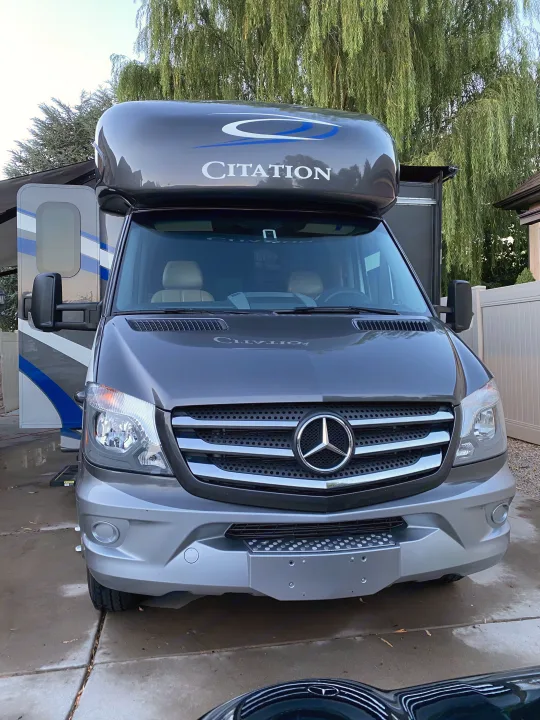 Front view of a sleek grey Mercedes-Benz Citation RV rental, a Class C motorhome ready for adventures.. Thor Motor Coach Citation 2018