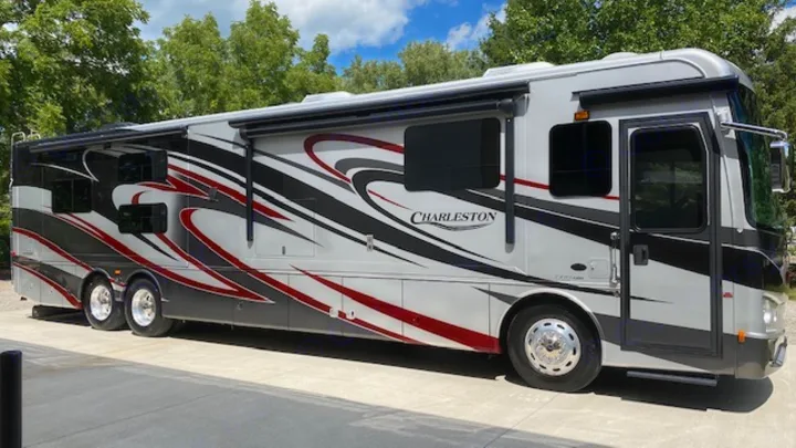 Luxury silver RV rental with dynamic black & red graphics. This spacious motorhome is ready for your ultimate road trip!. Charleston Charleston Motorhome 2015