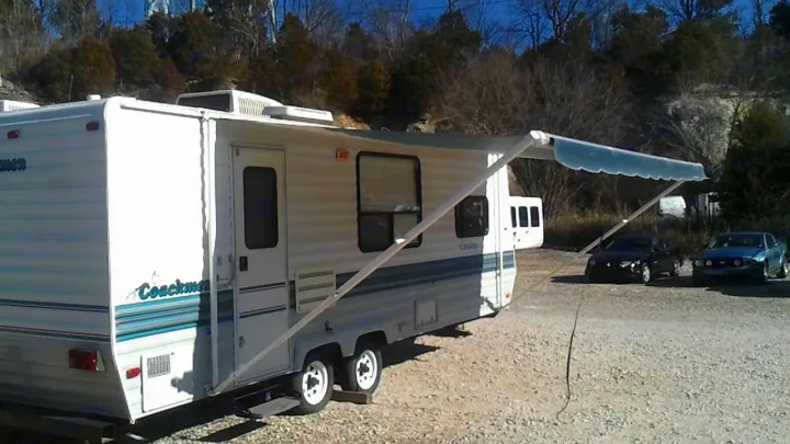 Sun awning, we supply a turf rug that lies under the awning.. Coachmen Catalina 1999