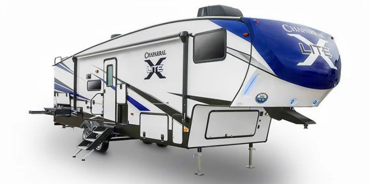 A modern white and blue Chaparral X Lite fifth-wheel RV, perfect for your next rv rental trip.. Coachmen Chaparral 2018