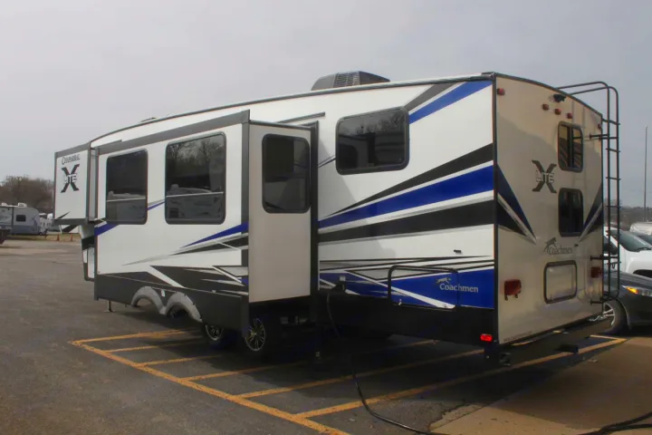 A white Coachmen Chaparral Lite RV, parked and ready for your next rv rental or road trip adventure.. Coachmen Chaparral 2018