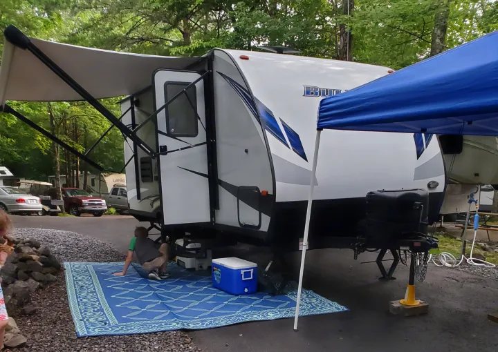 Camper setup with awning extended.. Keystone Bullet 2019