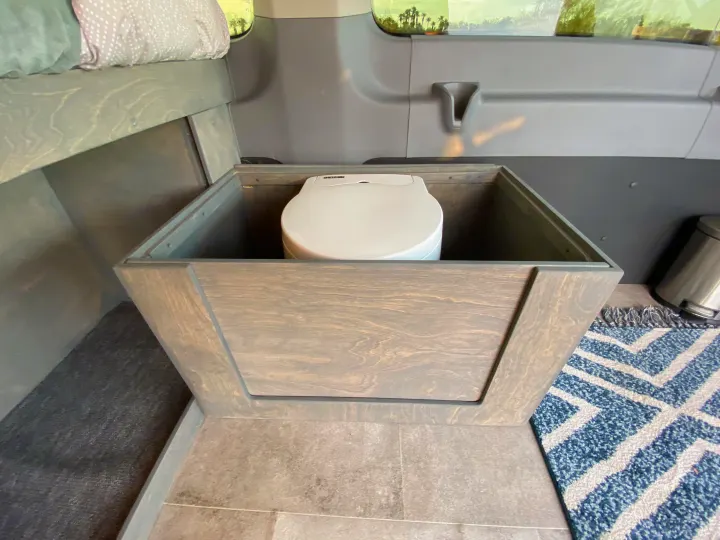 The front panel slides in from the top.. Ford Transit Camper Van 2017