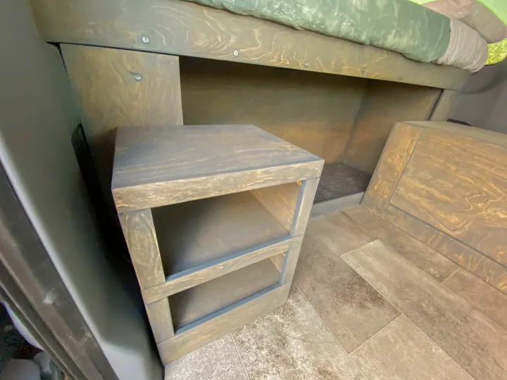 Large storage compartment below bed can be used as a bunk for a small child. . Ford Transit Camper Van 2017