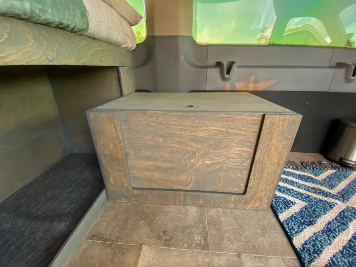 The top panel sits on top to make a bench. Ford Transit Camper Van 2017