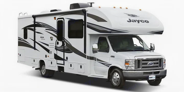 Modern white Class C motorhome, a perfect Jayco RV rental with sleek black decals for your journey.. Jayco Greyhawk 2019