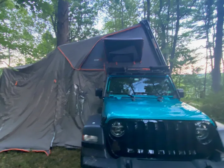Overland camping with a teal Jeep Wrangler, rooftop tent, and spacious annex. A cool alternative to an rv rental.. Other Other 2020