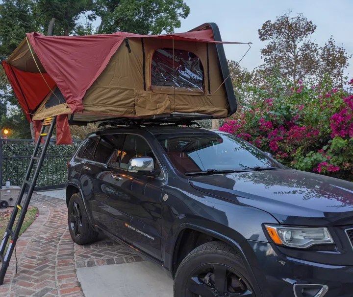 Roof top tent opens to a king size sleeping area. Also includes a full optional annex that can be attached. Jeep Grand Cherokee 2015