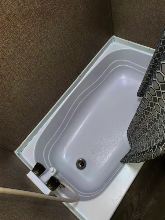 bathroom with shower/tub (small tub, good for kid baths!). Jayco Jay Flight 2021