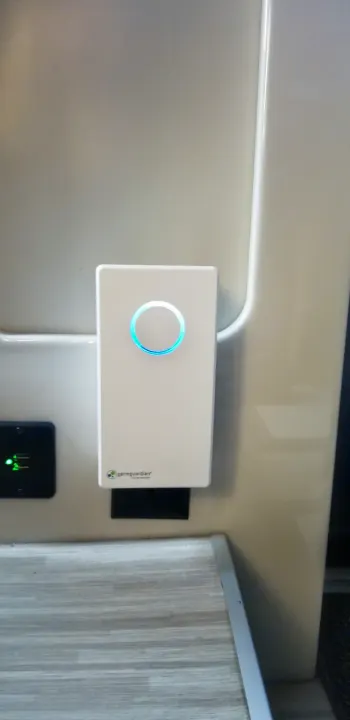 This RV rental interior features a GermGuardian air purifier with a glowing blue light and handy USB charging ports.. Thor Sequence 2021