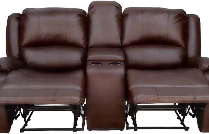 Comfortable brown leather dual reclining sofa with cup holders, ideal for an RV rental. Footrests extended.. Heartland Mallard 2019