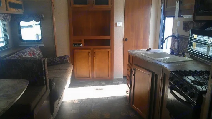 Bedroom is behind that door, couch and dinette are on the left slide, and kitchen is on the right.. Coachmen Other 2013