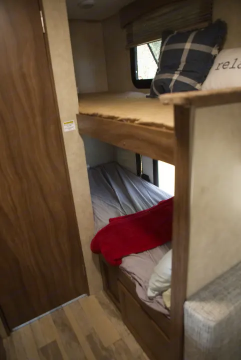 View of comfortable bunk beds in an RV rental, offering cozy sleeping space for your next travel adventure.. Forest River Other 2018