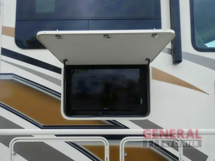 RV with an outdoor TV mounted inside an open compartment, ready for entertainment on your RV rental.. Other A.C.E 2020