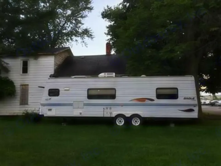 Well taken care of. Eagle Campers CHEROKEE HARD FLOOR FORWARD FOLD CAMPER 2000