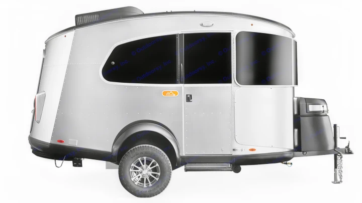 This compact, silver travel trailer is ideal for an RV rental, featuring a sleek design with large dark windows and robust wheels.. Airstream Basecamp 2023
