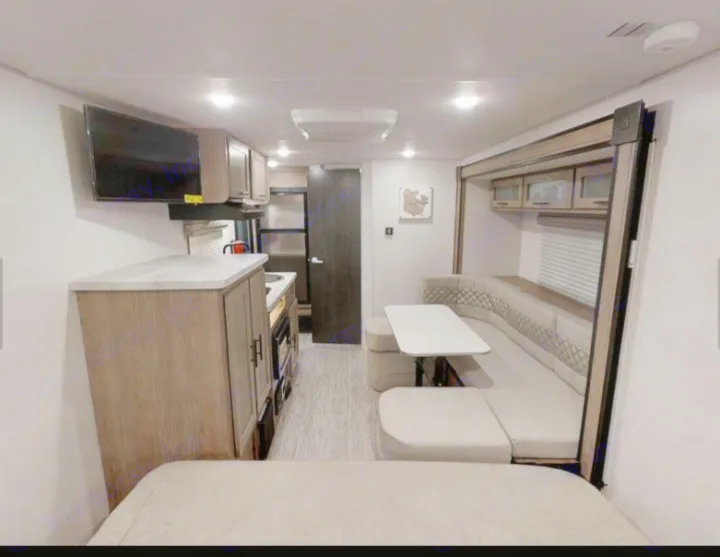 everything you need for a late night snack or catching up on the recent events before you rest. The tv pulls out and moves around to where you need it. Forest River Other 2019