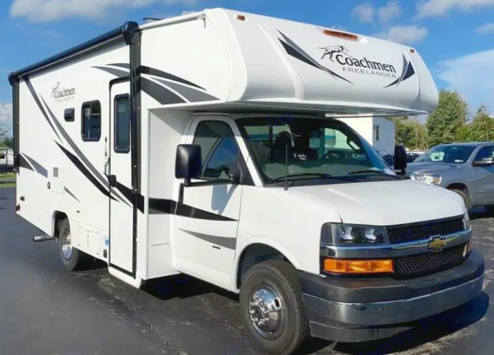 This image features a white Coachmen Freelander RV rental. It's a spacious vehicle, ideal for travel and adventures.. Coachmen Freelander 2021