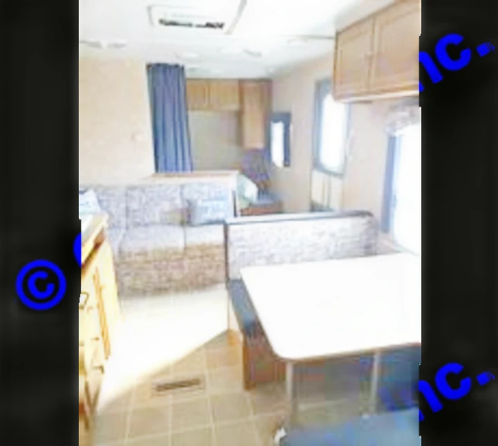 Dining table that converts to a bed for 2, sofa converts to a bed for 2. Dutchmen Sport 2004