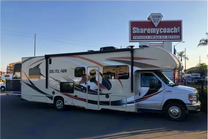 This "Outlaw" motorhome is ready for your next RV rental adventure, parked near a Sharemycoach.com rentals sign.. Thor Motor Coach Outlaw 2019