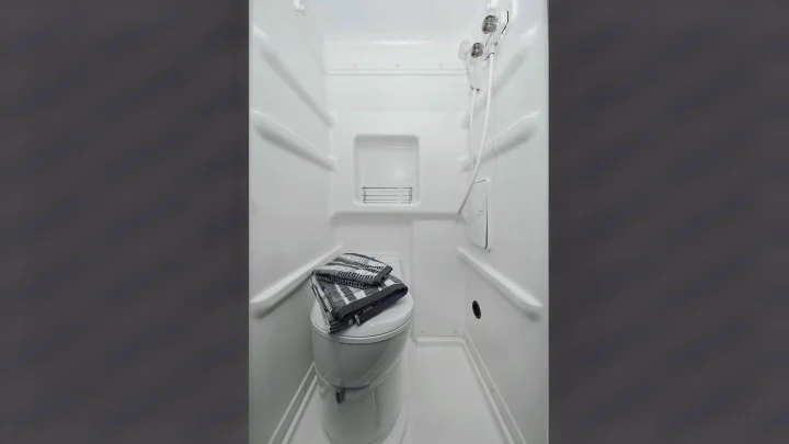 This RV rental features a compact wet bath with a toilet and shower, perfect for on-the-go living.. Winnebago Solis 2021