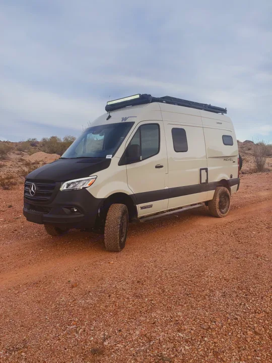 This photo was taken in the desert just outside of AZ. The front hood is a carbon fiber wrap to avoid scratches/dents from driving.. Winnebago Revel 2021