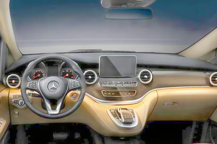 RV rental: Luxurious Mercedes-Benz interior with modern steering wheel, dashboard, and infotainment display for premium comfort.. Mercedes Marco Polo Class V 250d 2022