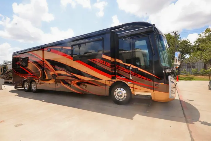 This luxury Class A motorhome, an Entegra Anthem, features striking custom graphics. Perfect for a premium RV rental.. Entegra Coach Anthem 44B 2017