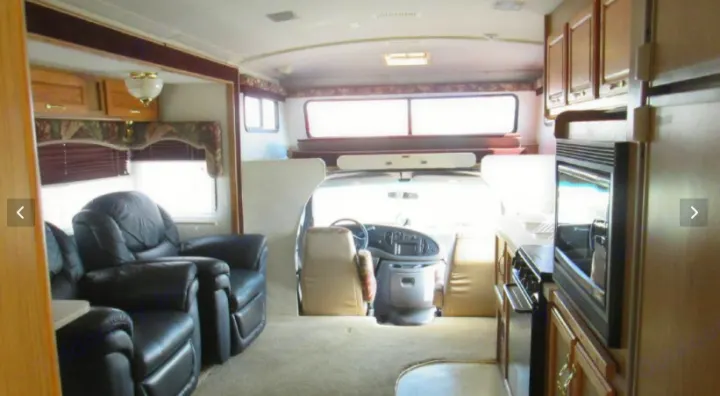 Inside this spacious RV rental, you'll find a living area with recliners, a kitchen, and a front cockpit.. Fleetwood Jamboree Sport 1999
