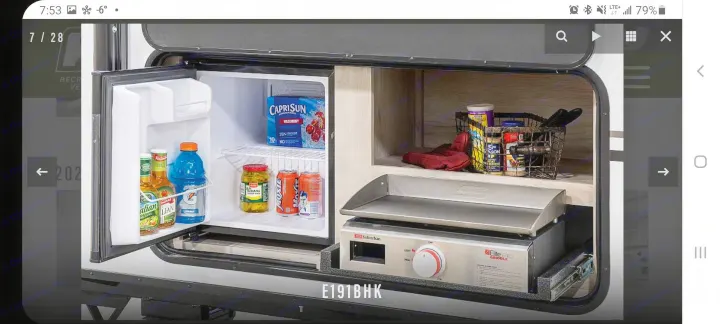 RV rental outdoor kitchen: a mini-fridge with drinks/food, pull-out Suburban griddle, and spice storage. Ready for your trip!. K-Z Manufacturing Escape 191bhk 2021