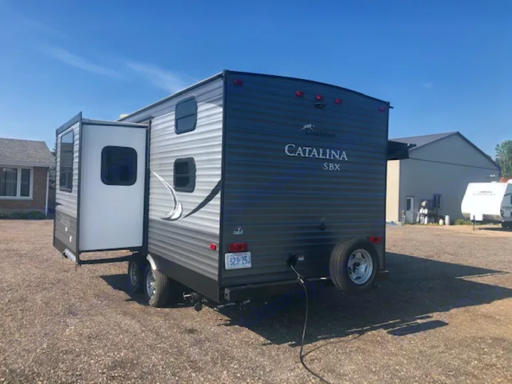 Coachmen Catalina SBX travel trailer with extended slide-out, ready for your next RV rental adventure.. Catalina 221TBS 2018